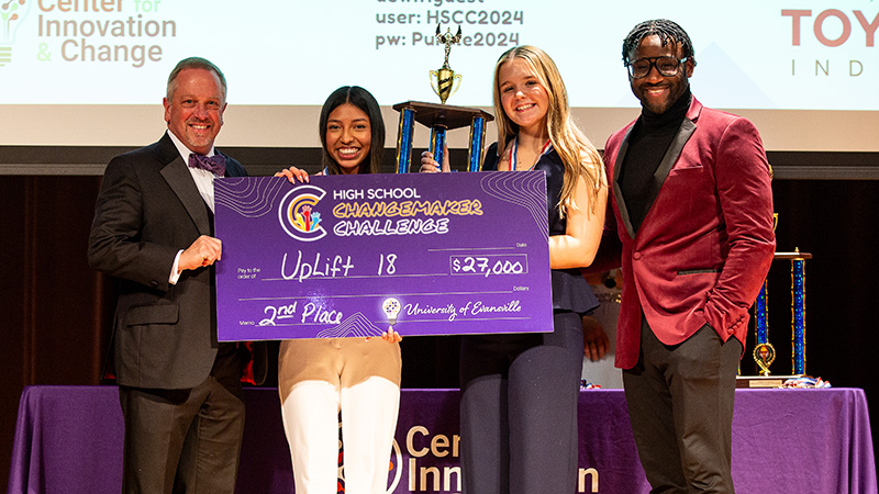 UpLift18 winners with giant check
