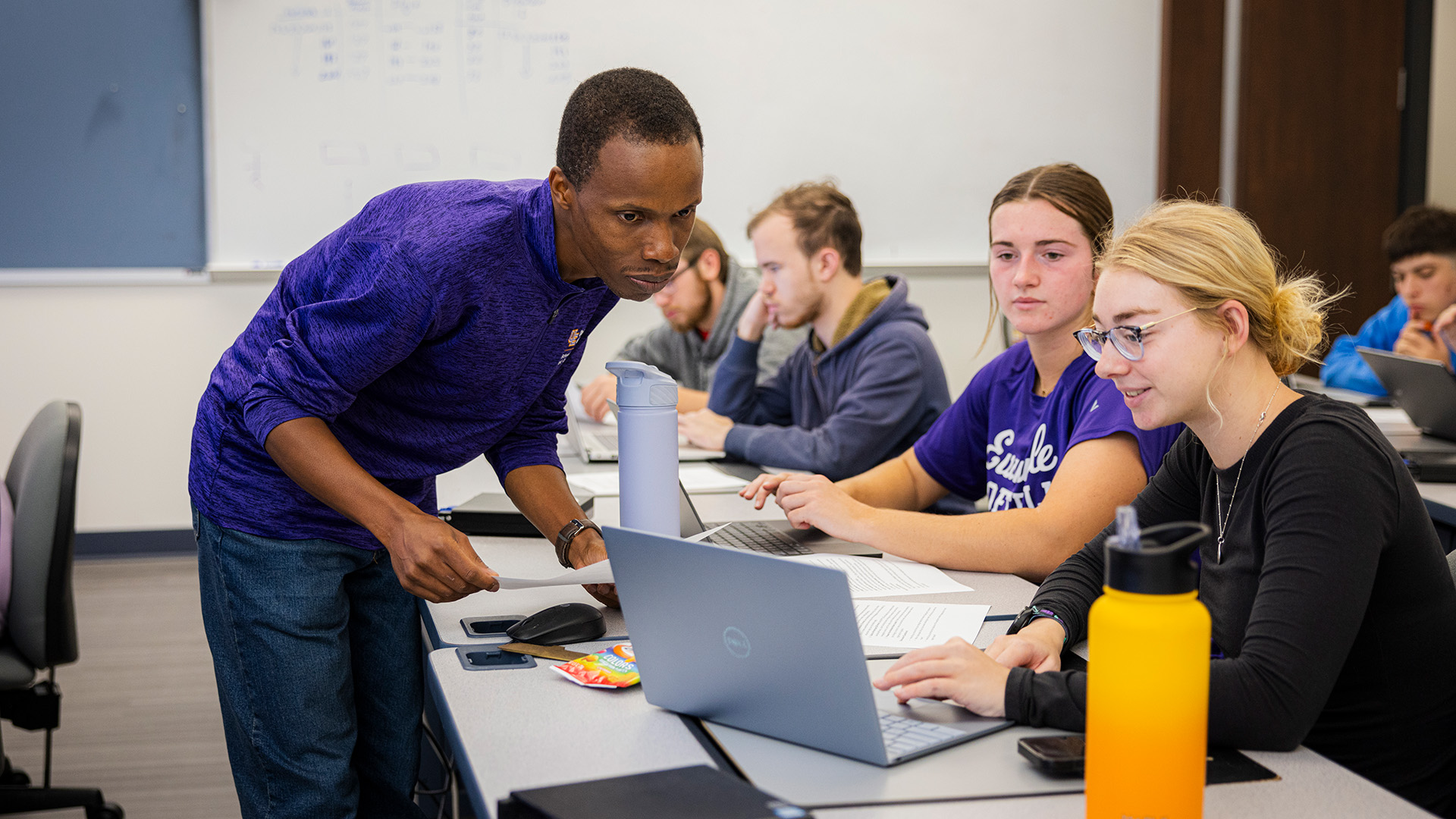 Maxwell Omwenga teaching a class