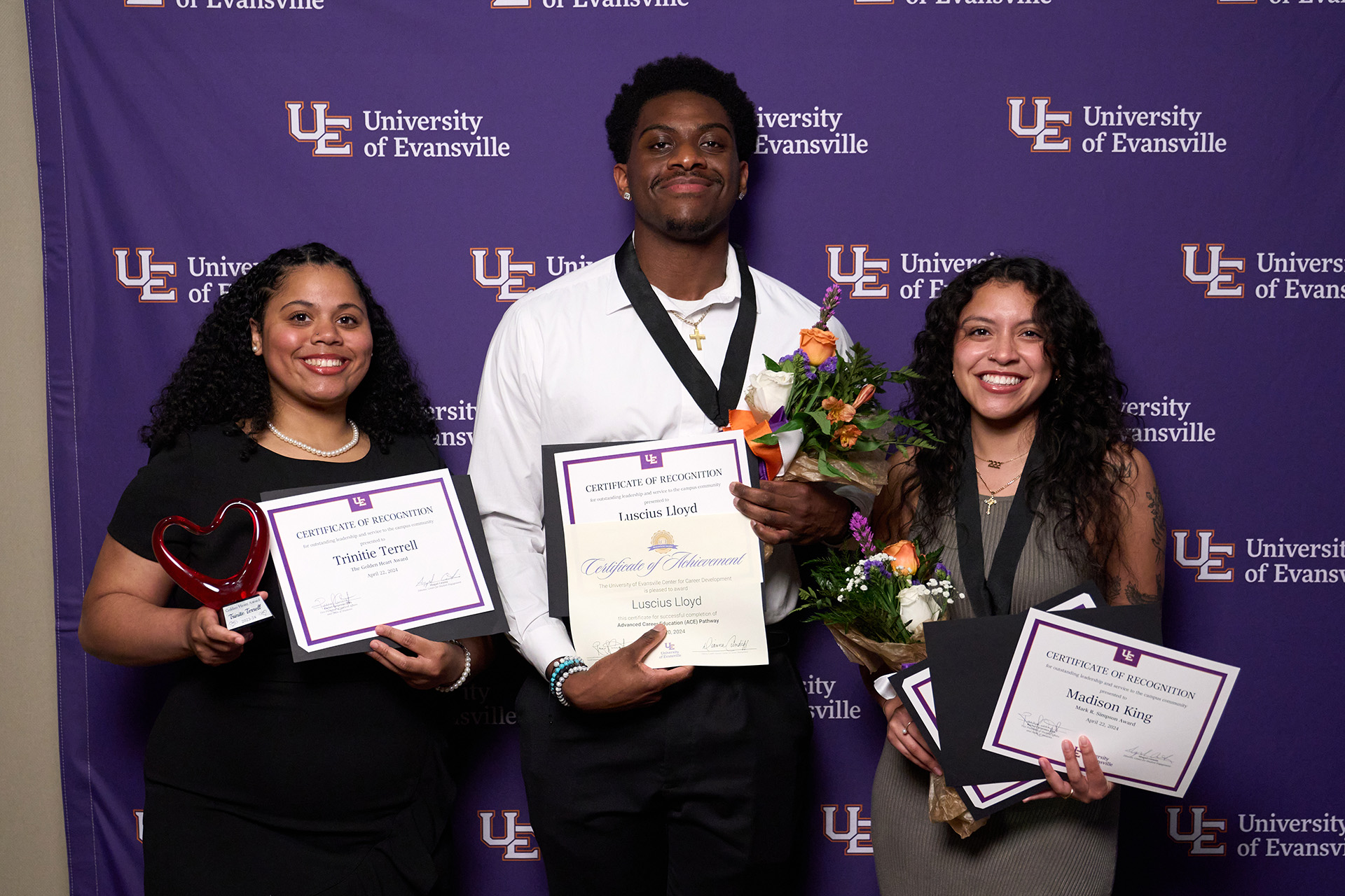 Students holding leadership awards